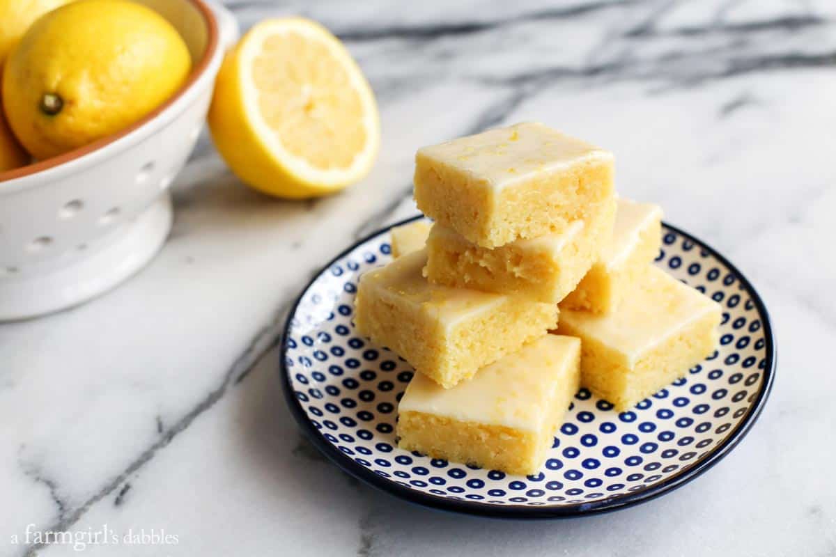 lemon heaven bars and bowl of lemons