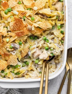 Homemade sour cream and onion tuna noodle casserole in baking dish.