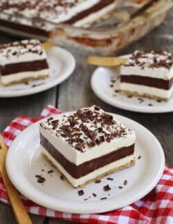 Three slices of layered chocolate pudding on plates