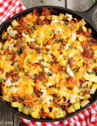 Cheesy Grilled Skillet Potatoes with Bacon and Herbs