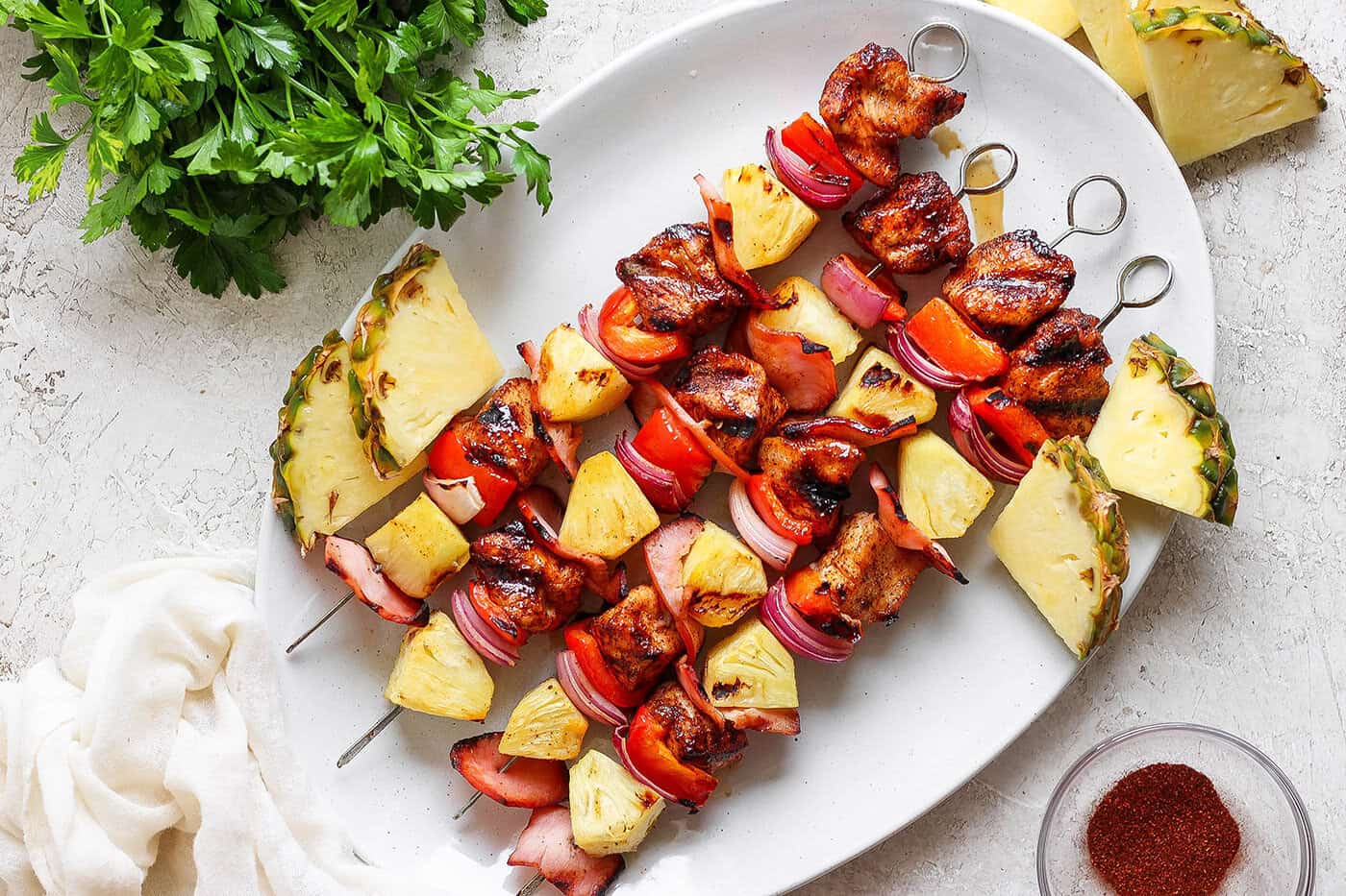 Overhead view of Hawaiian chicken chili kabobs on platter