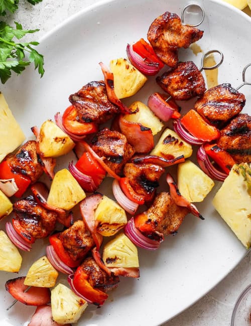 Overhead view of Hawaiian chicken chili kabobs on platter