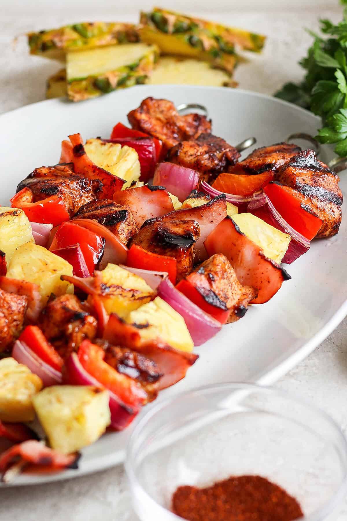 Platter of grilled Hawaiian chicken kabobs