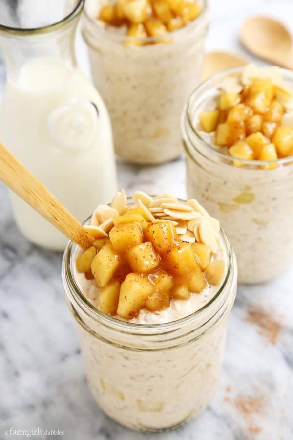 three mason jars filled with Apple Cinnamon Overnight Oats