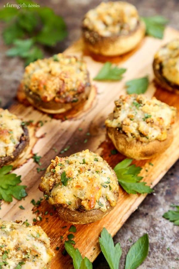 Cheesy Stuffed Mushrooms Grilled on a Cedar Plank with fresh parsley