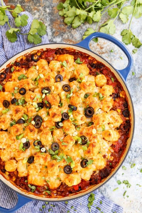 Taco Tater Tot Hotdish in a blue baking pan