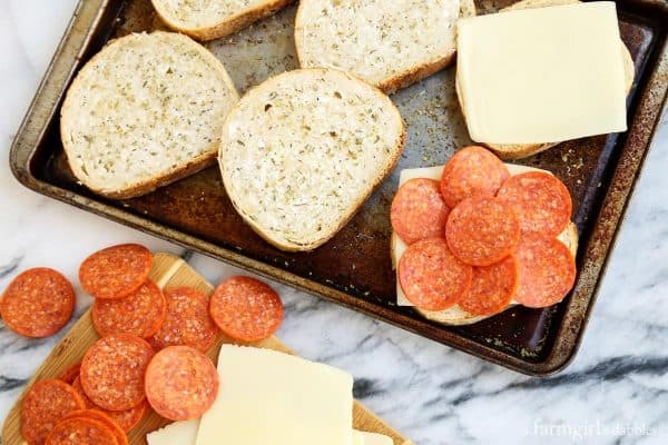 assembling the grilled cheese before cooking them