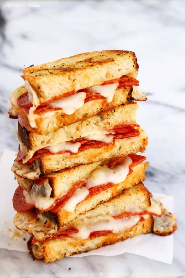 a stack of Pepperoni Pizza Grilled Cheeses