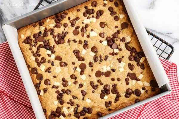 Triple Chocolate Coconut Blondies on a cooling rack
