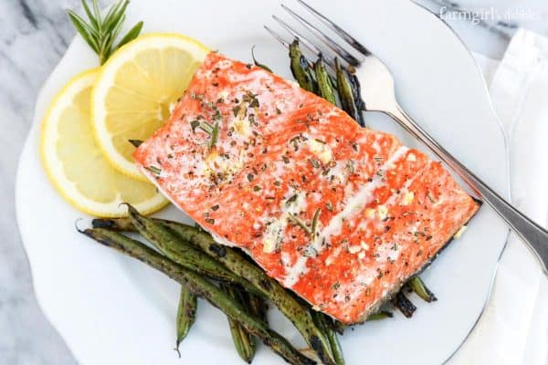 10-Minute Garlic and Rosemary Roasted Salmon on a white plate