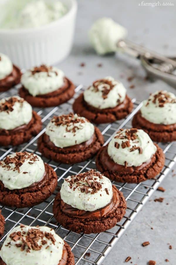 Mint Chocolate Chip Buttercream Brownie Cookies on a cooling rack