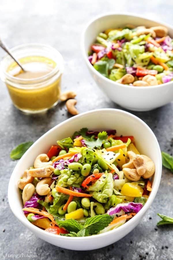 two bowls Chopped Salad with Coconut Green Curry Dressing