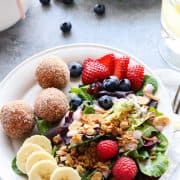 Breakfast Salad with Berry Yogurt Dressing and donut holes