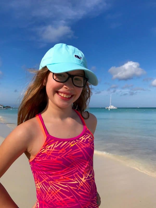 a girl on a beach in Aruba