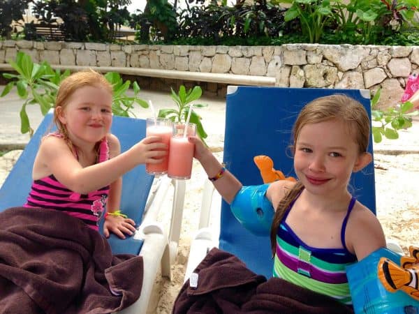 two girls drinking pink panthers in Mexico