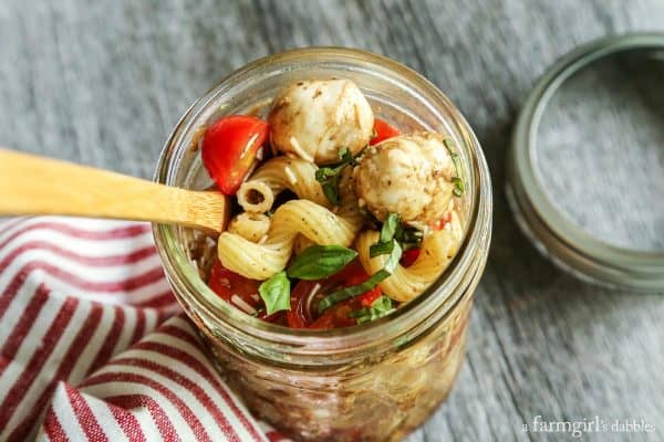 a mixed Caprese Pasta Salad