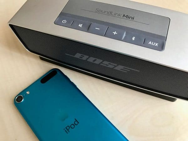 bose speaker and a blue ipod