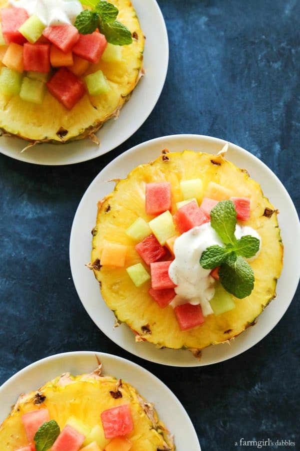 Pineapple Fruit Salad with Honey Vanilla Bean Yogurt Dressing on a white plate