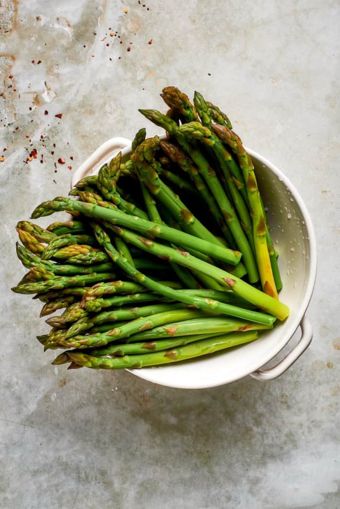 Asparagus in colander.
