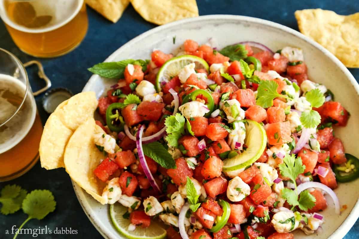 ceviche, chips, and two glasses of beer