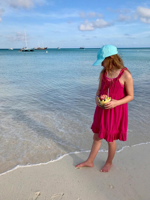 a girl holding an acai bowl from Eduardo's Beach Shack