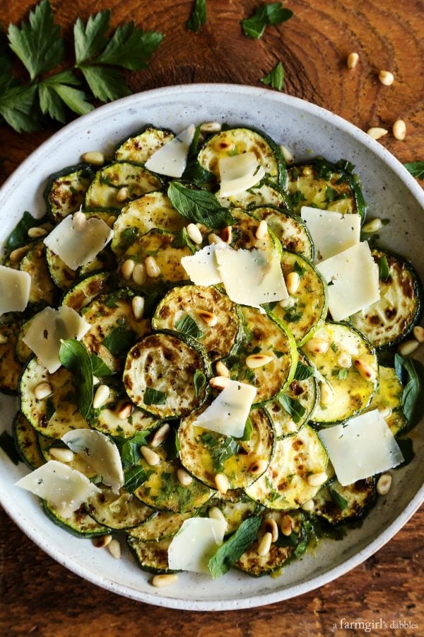 Grilled Zucchini Salad with Lemon-Herb Vinaigrette in a white bowl