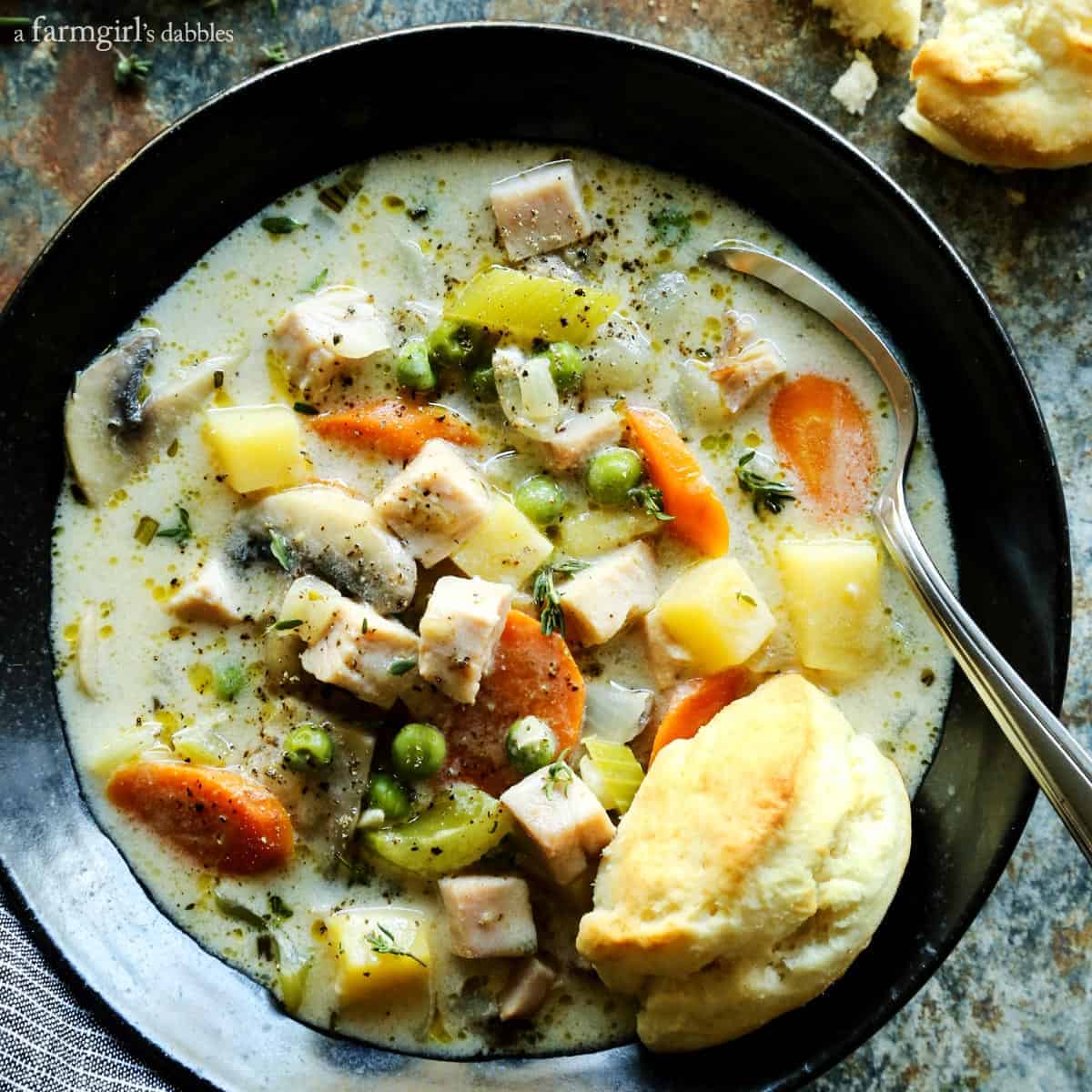 Smoked Turkey Pot Pie Soup in a black bowl