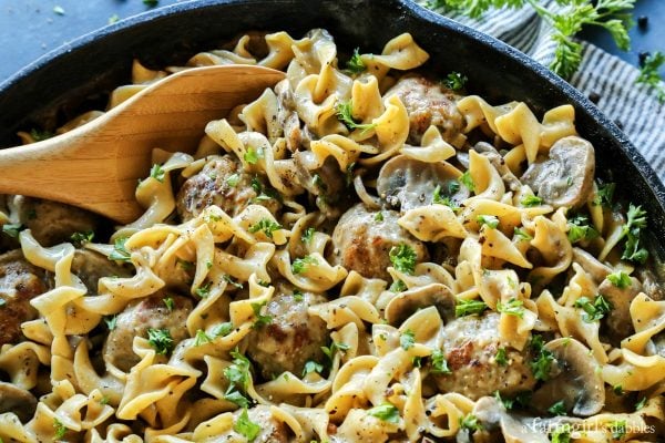 Chicken Meatball Stroganoff with a wood serving spoon
