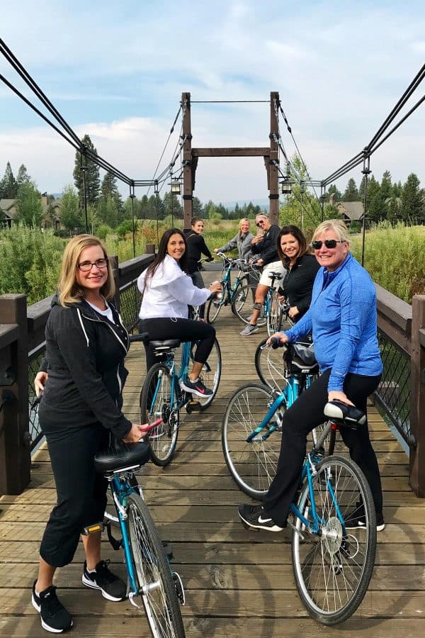 a group of women riding bikes