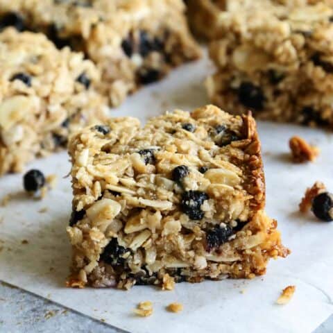 A chewy granola bar with blueberries and almonds
