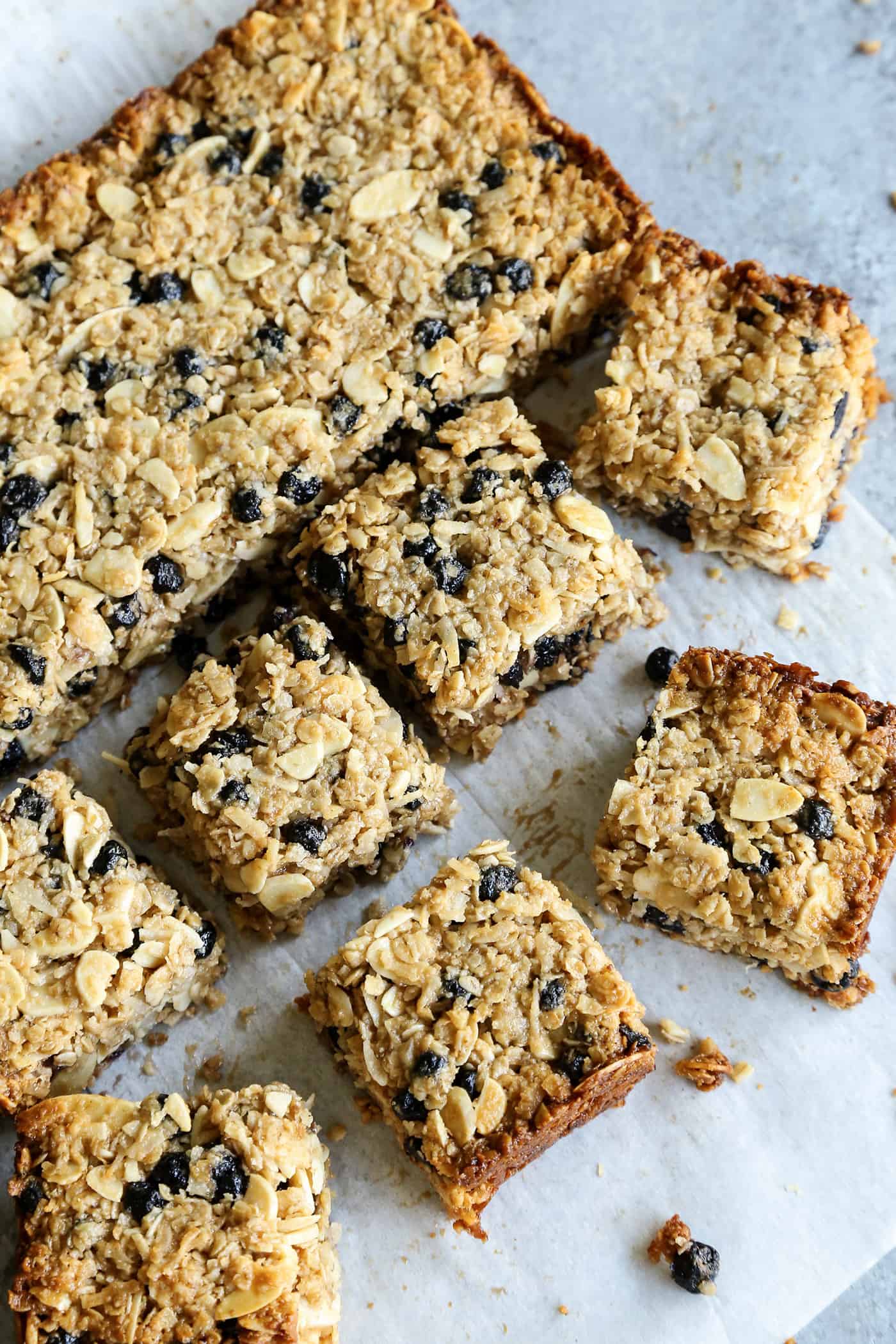 Chewy granola bars with blueberries cut into squares