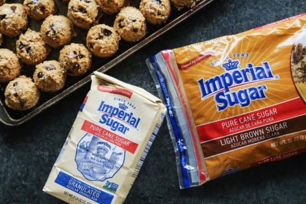 a bag of granulated sugar and light brown sugar from Imperial Sugar, plus a pan of cookie dough