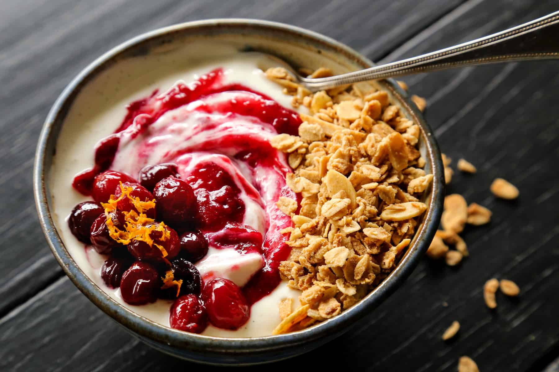Leftover cranberries stirred into yogurt
