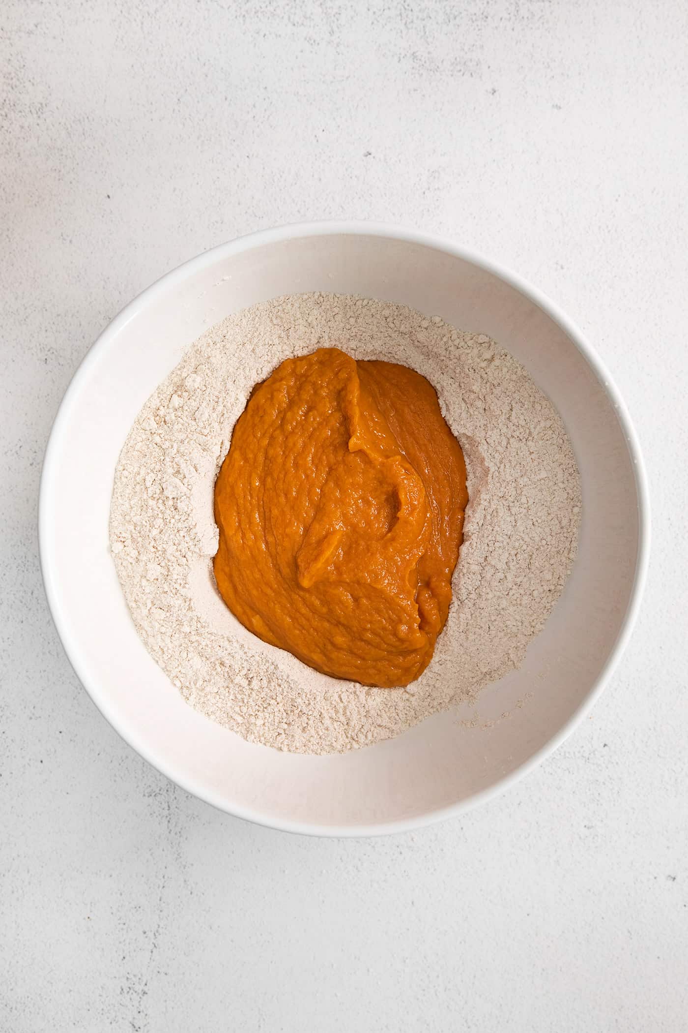 Pumpkin puree on top of dry ingredients