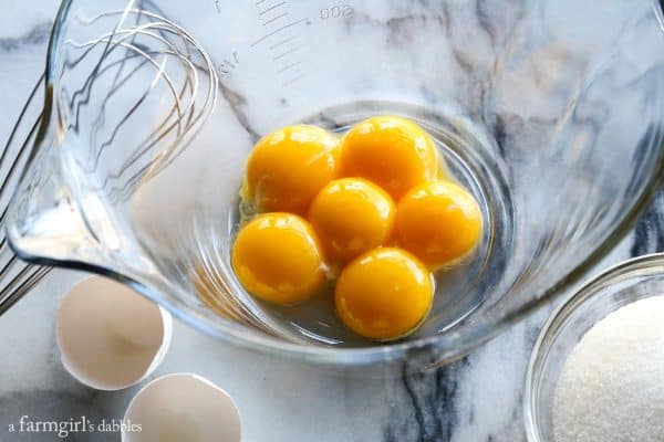 egg yolks in a clear mixing bowl