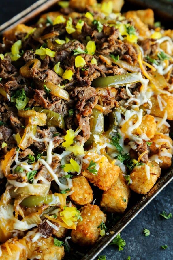 Cheesesteak Totchos on a baking sheet