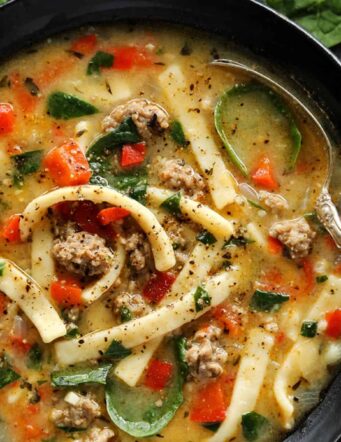a bowl of Sausage and Red Pepper Soup with Egg Noodles