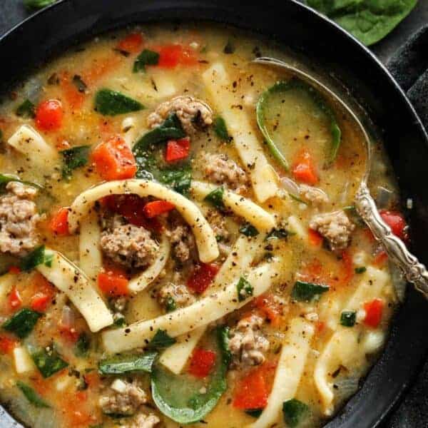 a bowl of Sausage and Red Pepper Soup with Egg Noodles