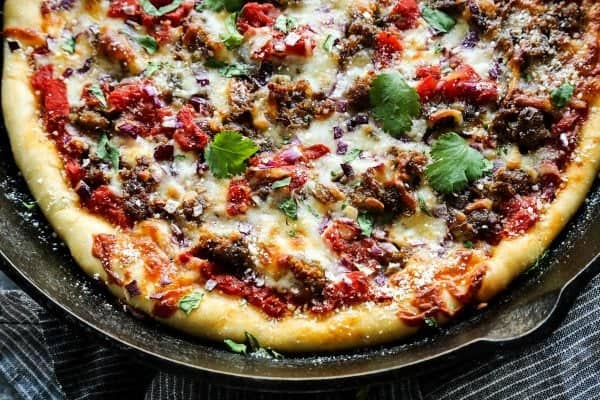 Skillet Pizza with Sausage and Chili Garlic Tomato Sauce