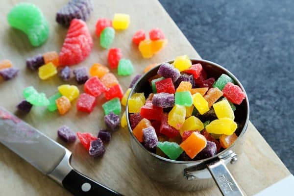 colorful gumdrops on a cutting board, cut into small pieces