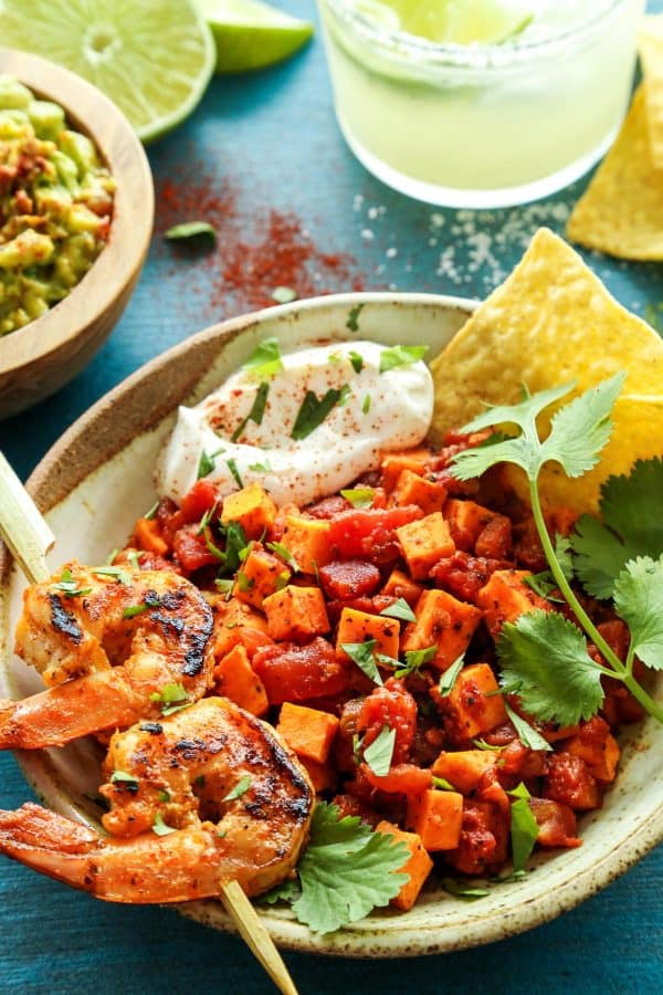 Mexican Sweet Potato and Tomato Grilled Shrimp Bowls with guacamole and a margarita