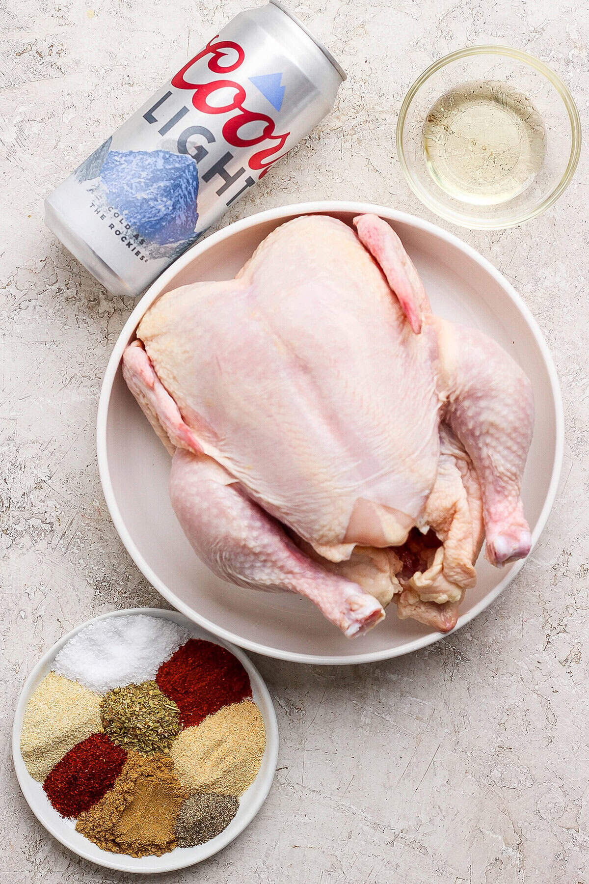 Overhead view of ingredients for beer can chicken