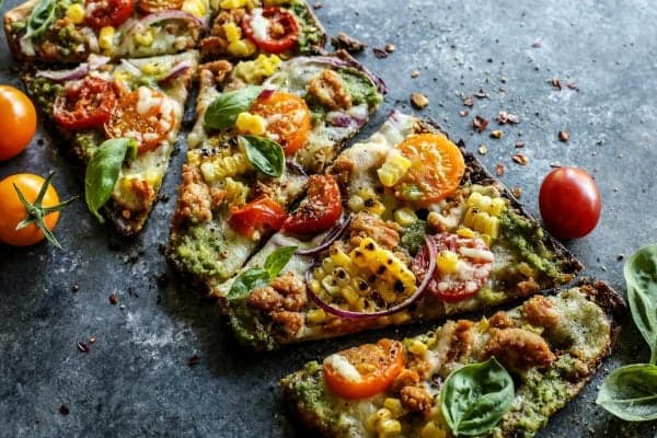 flatbread pizza grilled and cut into random pieces