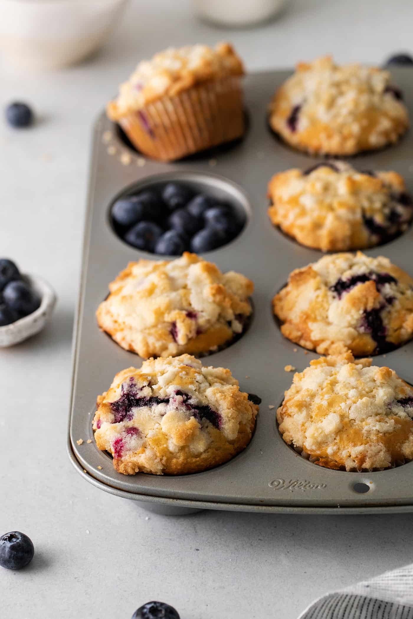 Blueberry muffins in a muffin tin