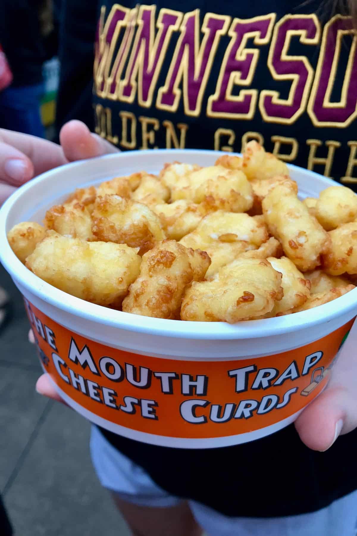 cheese curds in a tub