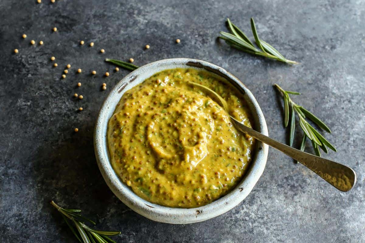 Homemade mustard sauce in a white dish