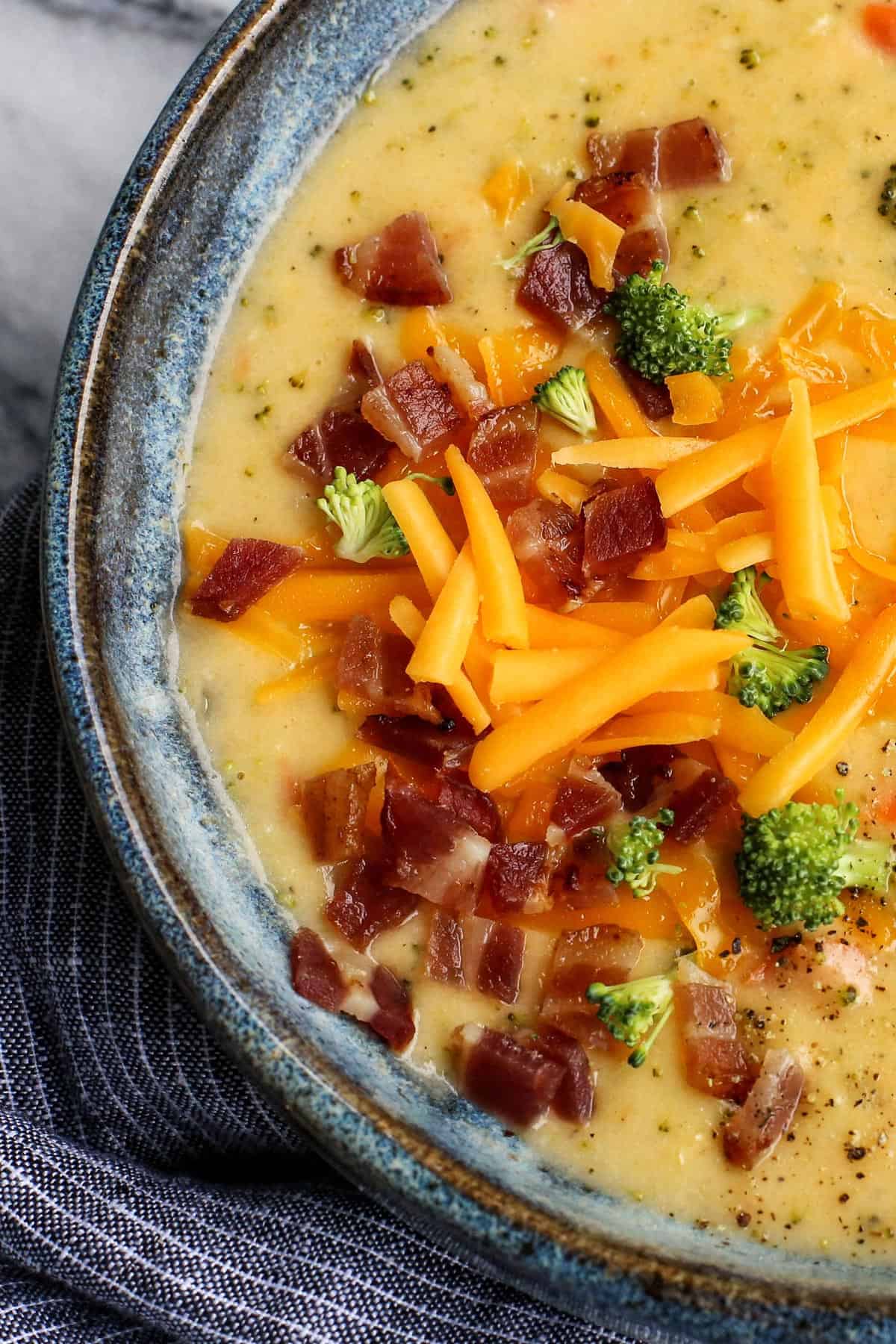 Broccoli Cheddar Soup in a blue bowl