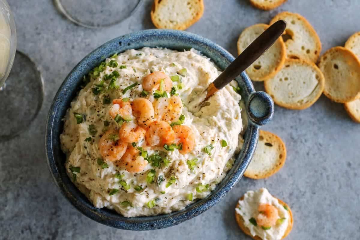 Blue pottery bowl of shrimp dip.