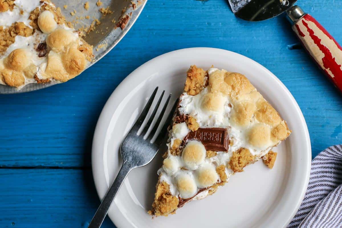 S'mores Pie slice taken out of whole. pie