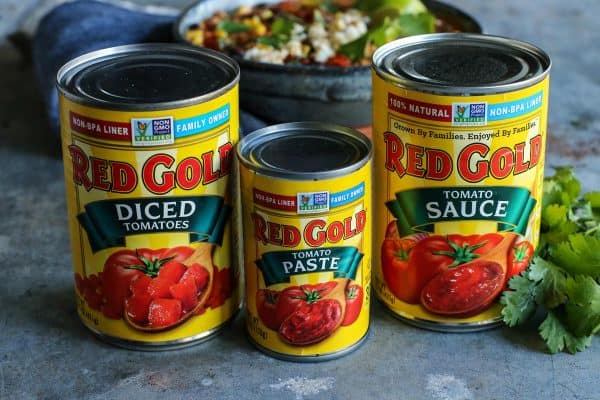 three cans of Red Gold Tomatoes